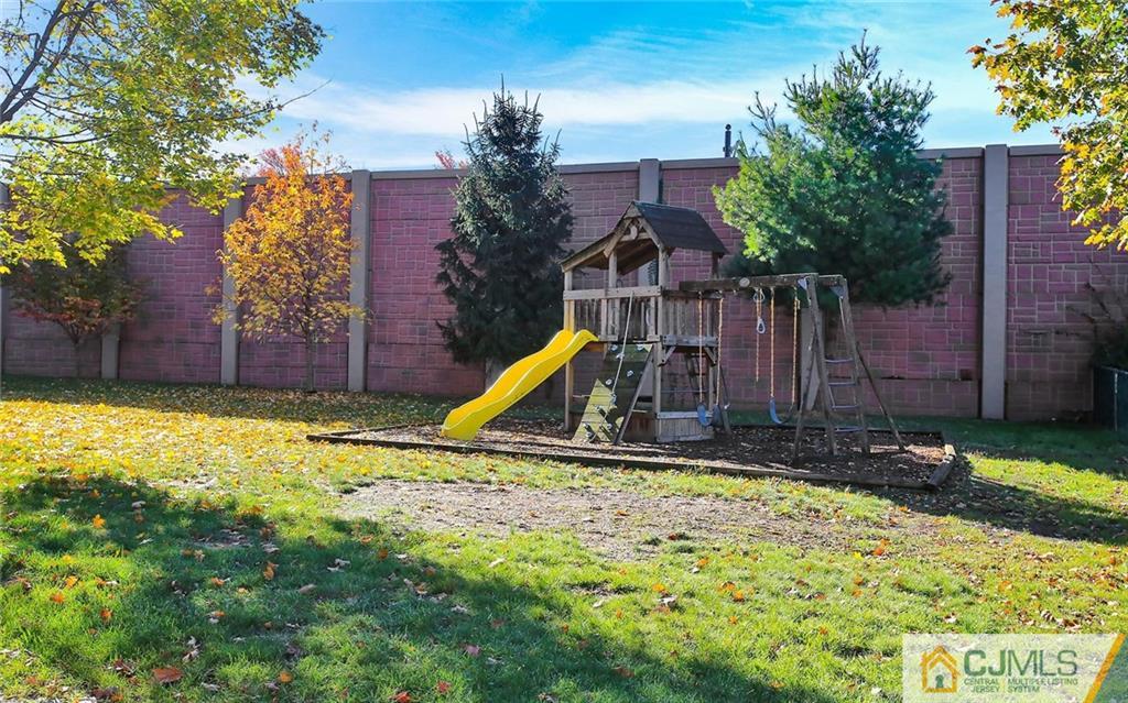 4 Carpender Road New Brunswick, NJ 08901 - Photo 20 of 21 a view of outdoor space with swimming pool and porch