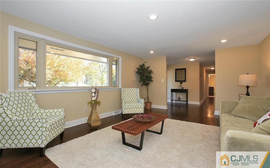 4 Carpender Road New Brunswick, NJ 08901 - Photo 5 of 21 a living room with furniture and a large window