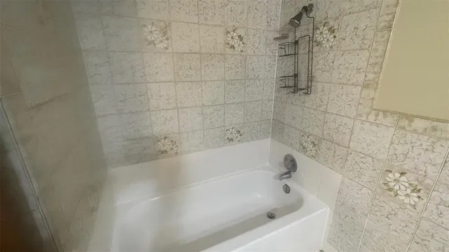 a bathroom with a bathtub