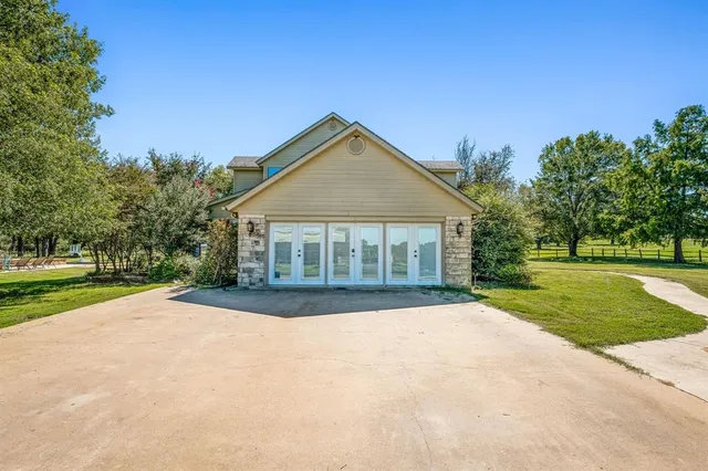 a view of outdoor space yard and front view of a house