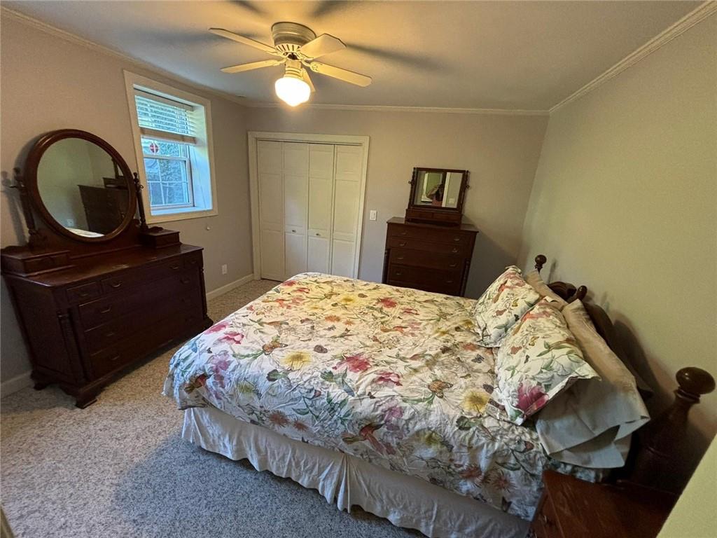 544 East Ponce De Leon Avenue, Unit TERRACE Decatur, GA 30030 - Photo 6 of 18 a bedroom with a bed and a dresser