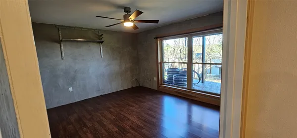 a bathroom with a shower and a toilet