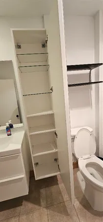 a view of a park with large trees