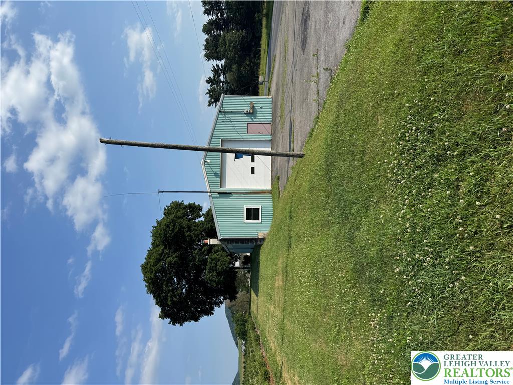 868 Catawissa Road Tamaqua, PA 18252 - Photo 15 of 67 A utilitarian structure with siding offers ample outdoor space and functional appeal.