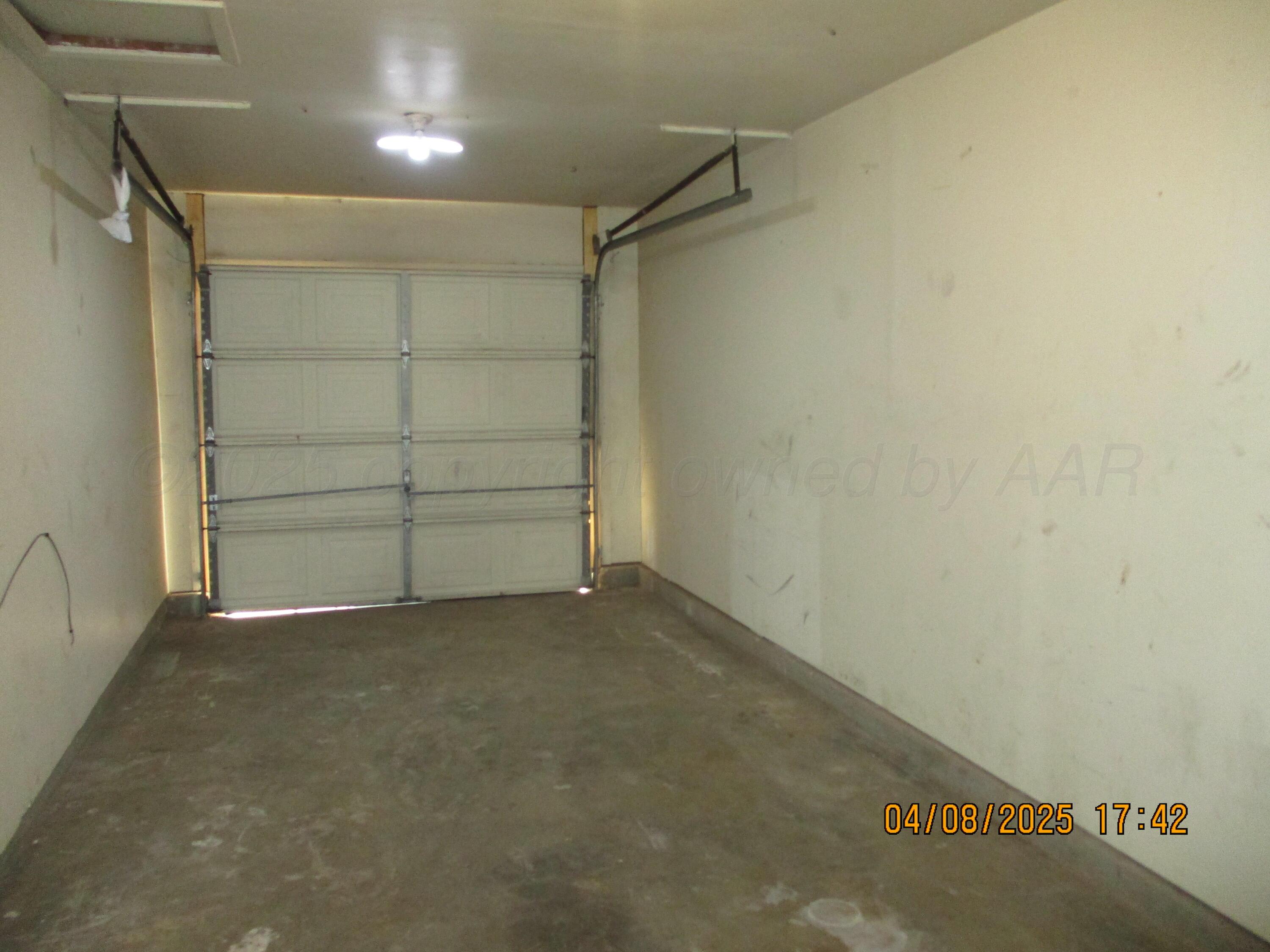 2913 Ricks Street Amarillo, TX 79103 - Photo 14 of 14 an empty room with a bench