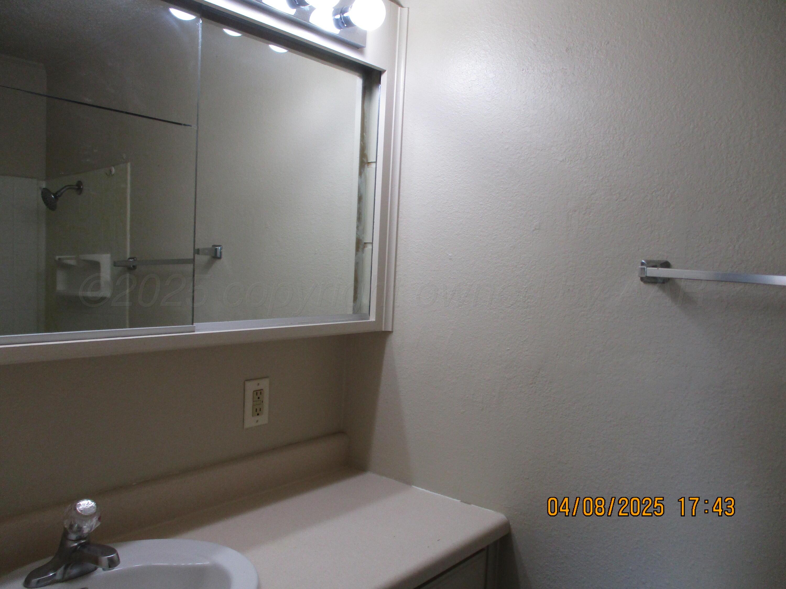 2913 Ricks Street Amarillo, TX 79103 - Photo 7 of 14 a bathroom with a toilet