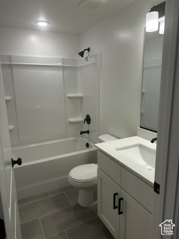 22 South Starlight Lane Mapleton, UT 84664 - Photo 16 of 17 Full bathroom with vanity, bathtub / shower combination, and tile patterned floors