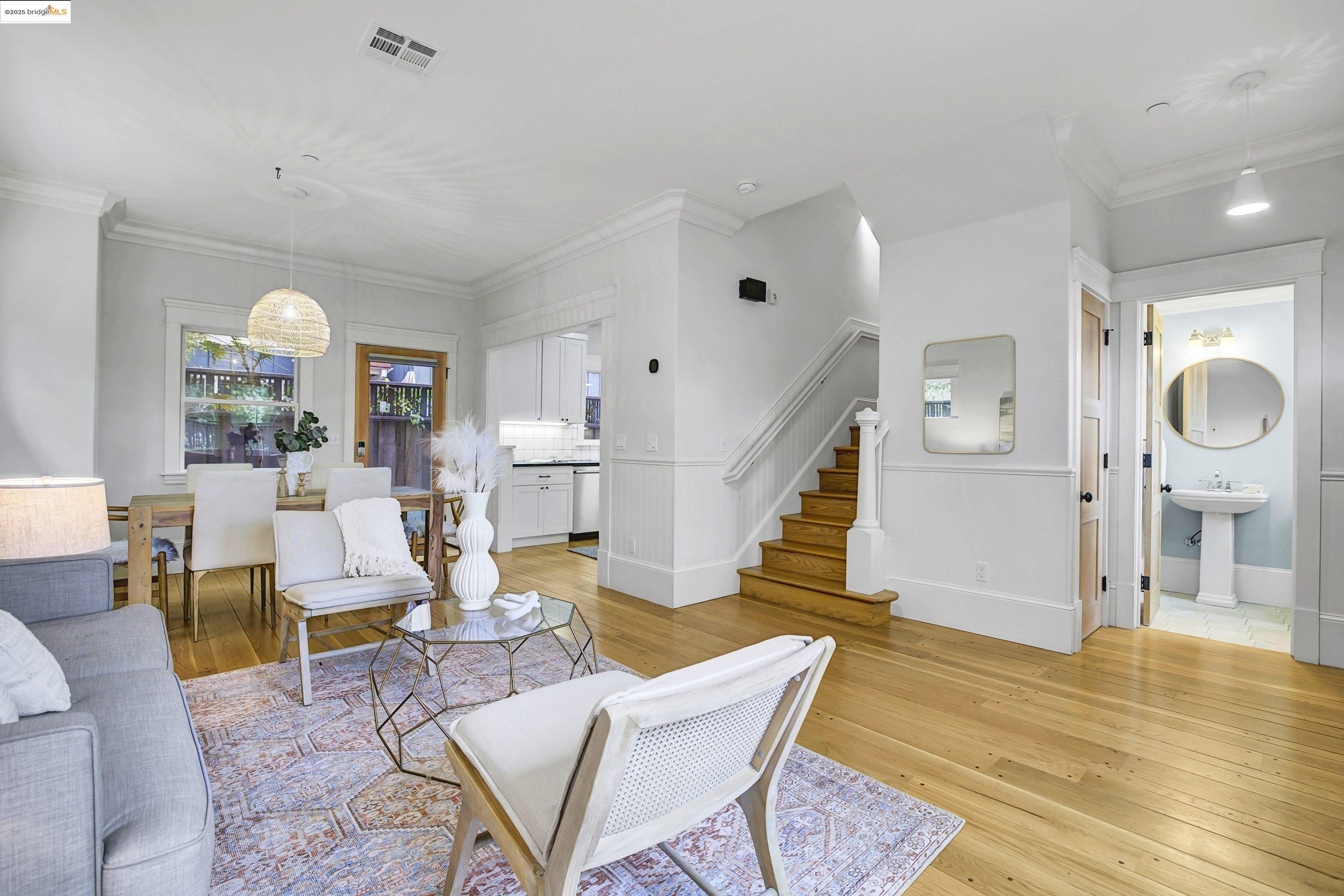 1911 Ninth Street, Unit A Berkeley, CA 94710 - Photo 1 of 39 a living room with furniture and a wooden floor