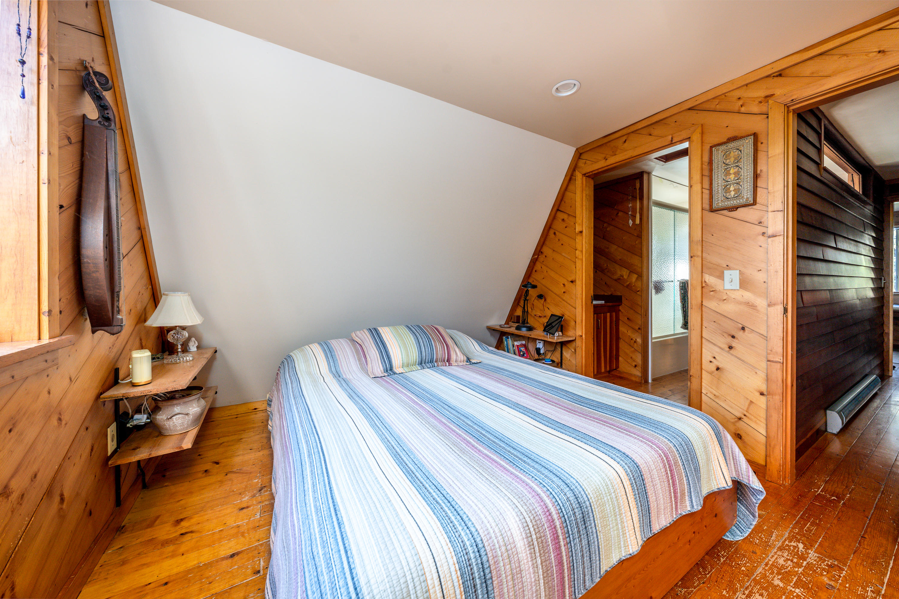 80 Peace Valley Road Wellfleet, MA 02667 - Photo 26 of 52 a bed room with a bed and a chair