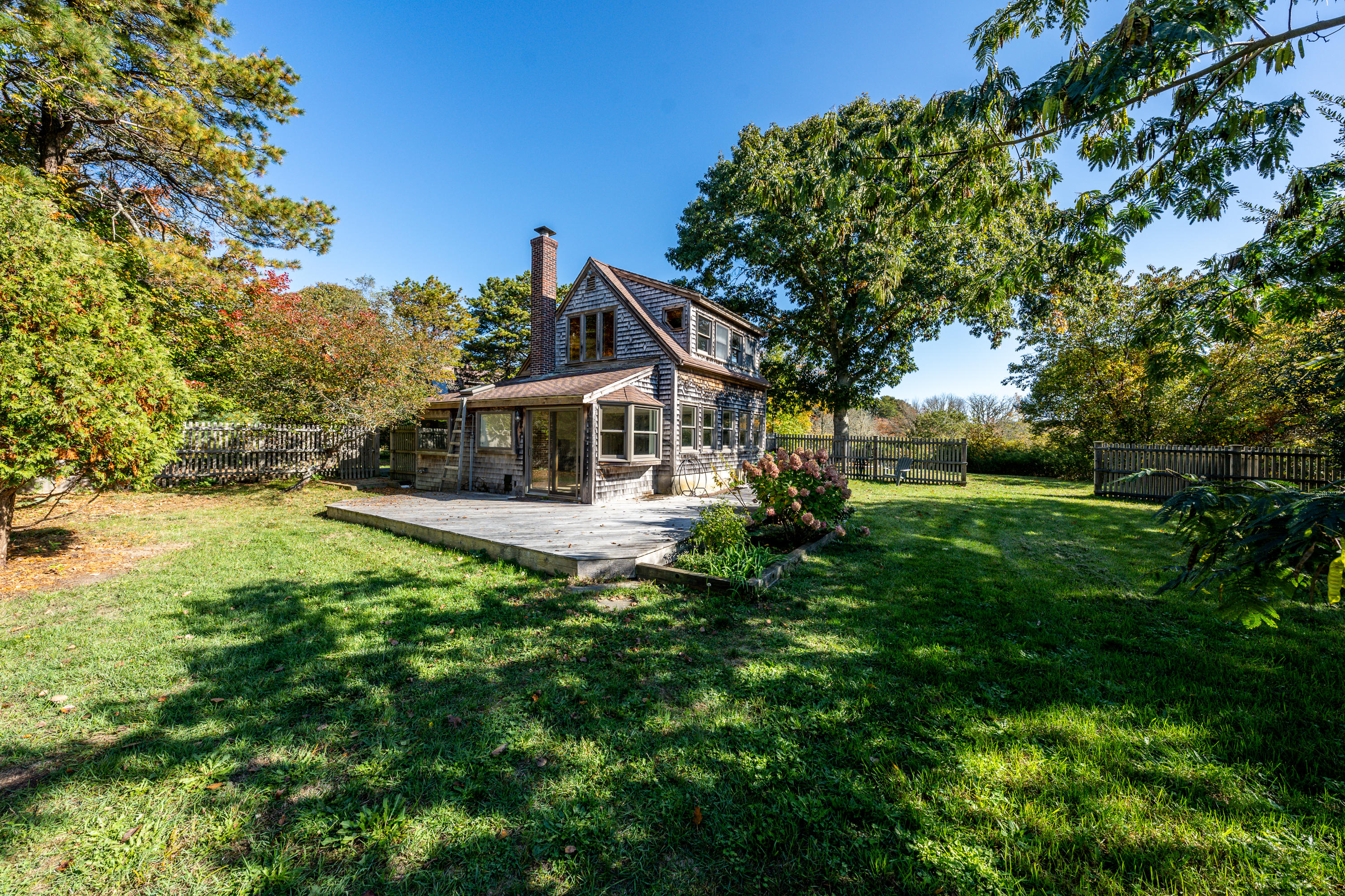 80 Peace Valley Road Wellfleet, MA 02667 - Photo 31 of 52 a view of a house with a big yard