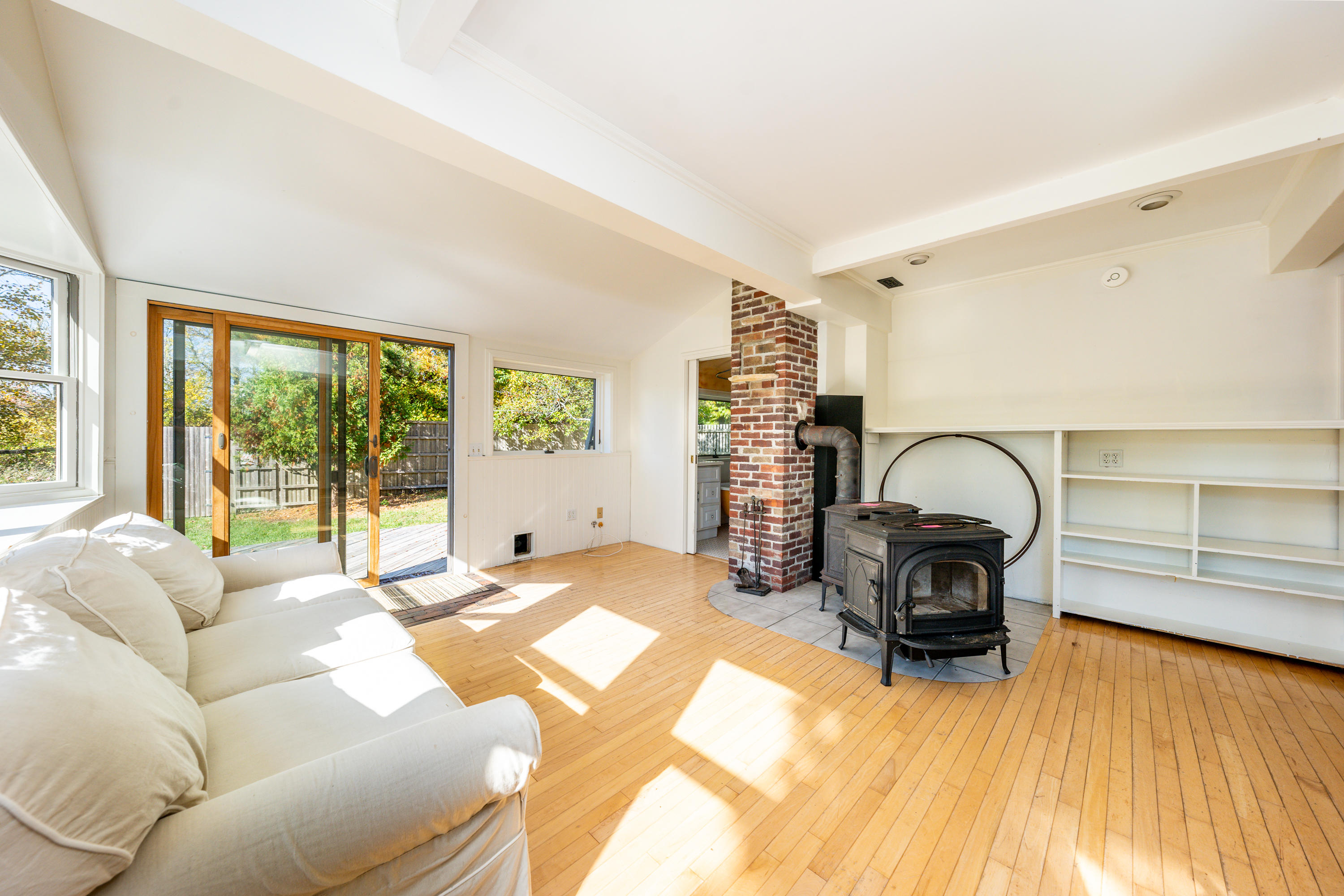80 Peace Valley Road Wellfleet, MA 02667 - Photo 39 of 52 a living room with furniture and large windows