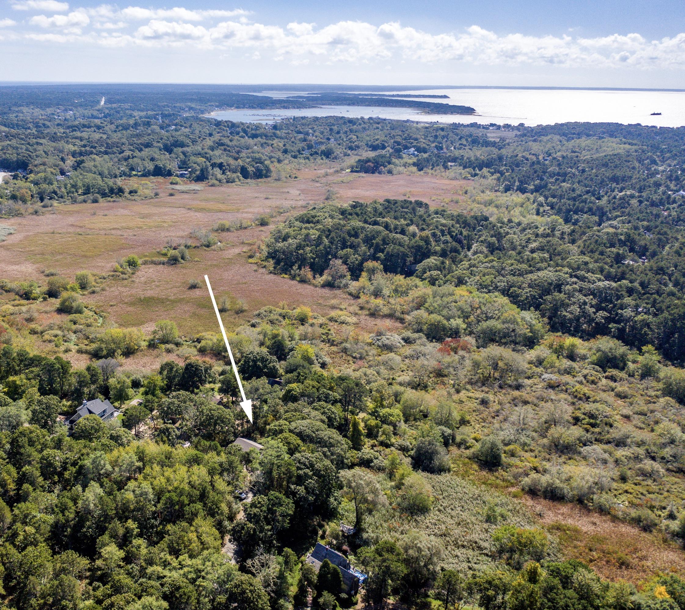 80 Peace Valley Road Wellfleet, MA 02667 - Photo 4 of 52 an aerial view of mountain with beach