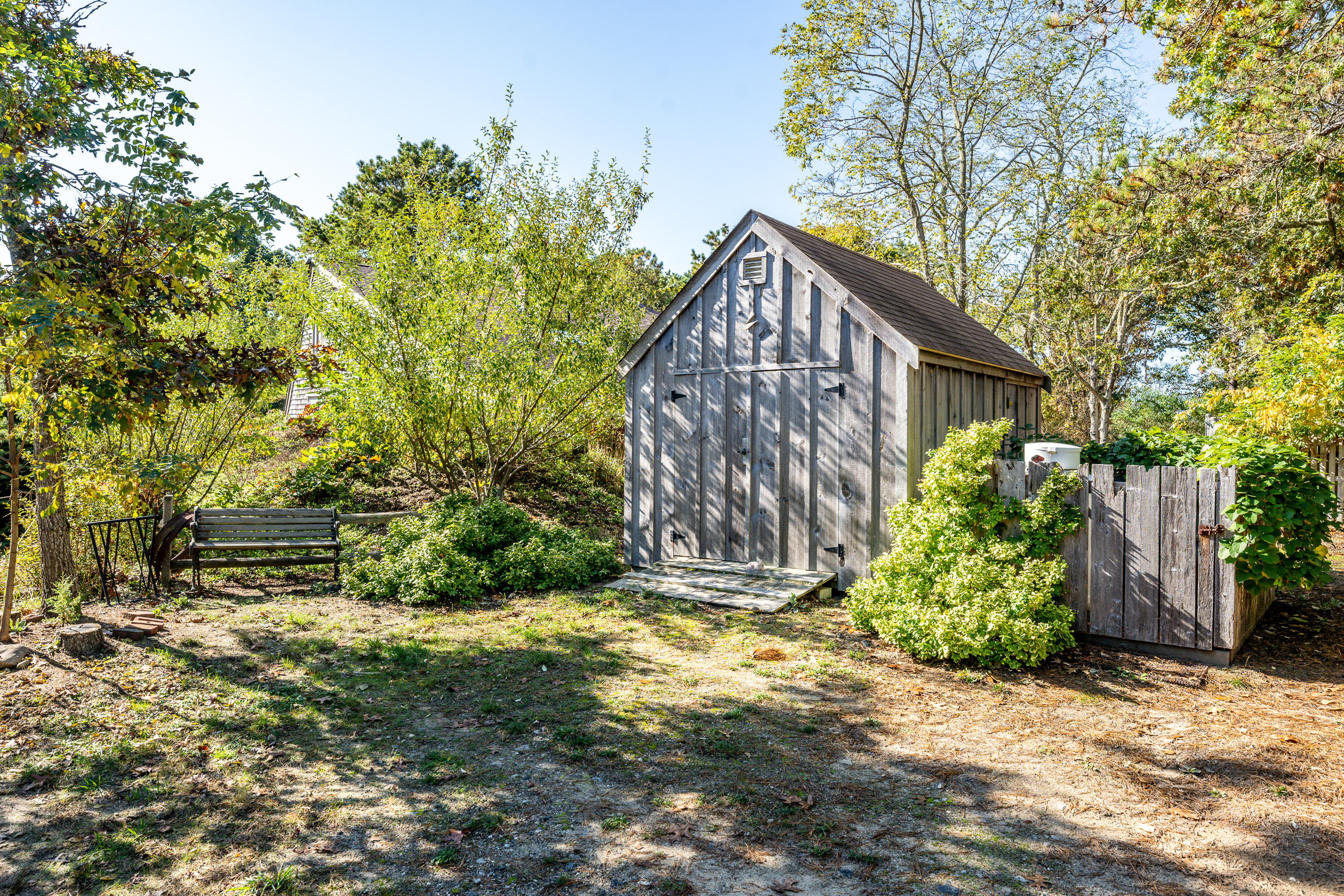 80 Peace Valley Road Wellfleet, MA 02667 - Photo 43 of 52 a view of a house with a yard