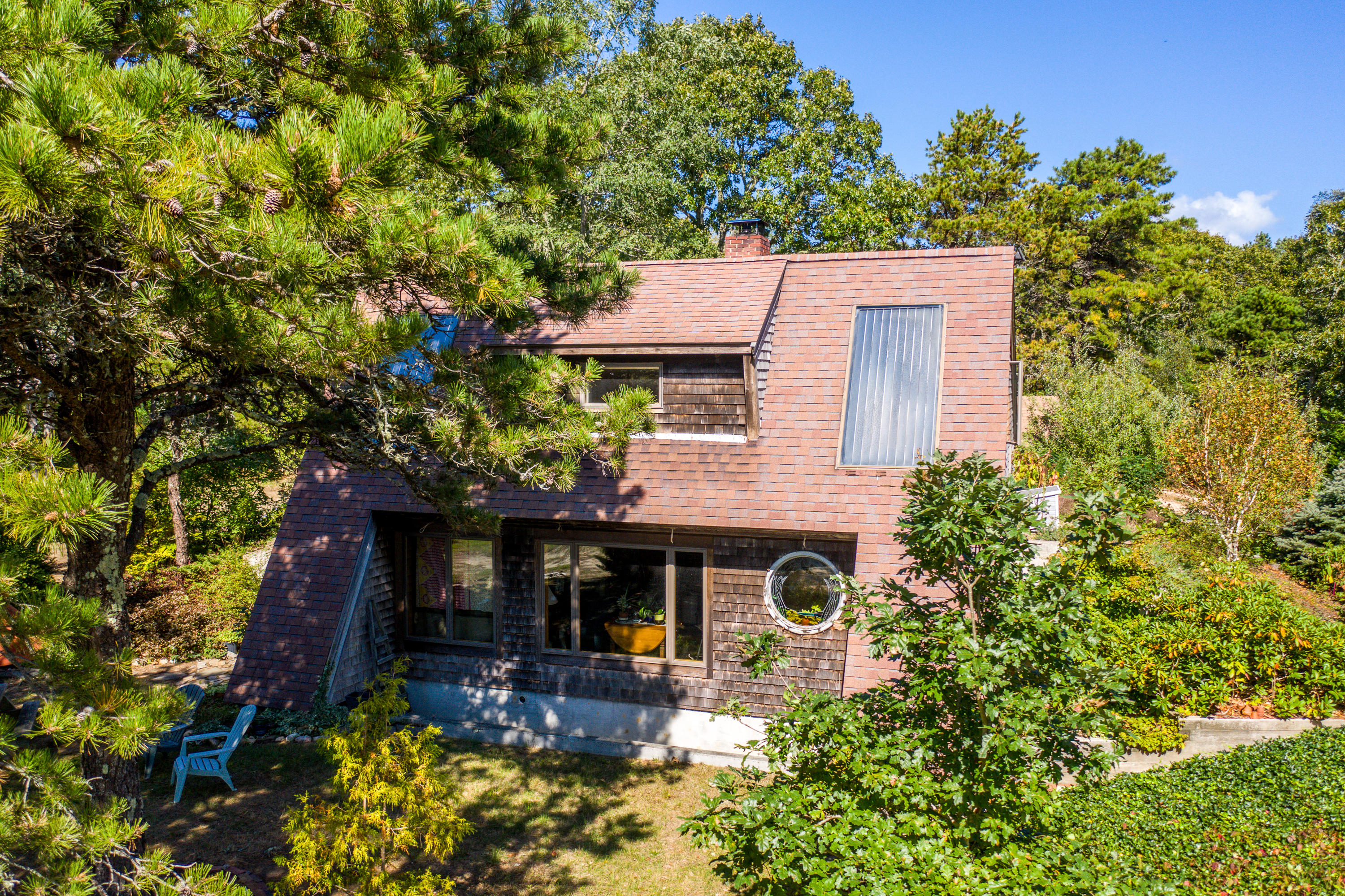 80 Peace Valley Road Wellfleet, MA 02667 - Photo 5 of 52 front view of a house with a yard