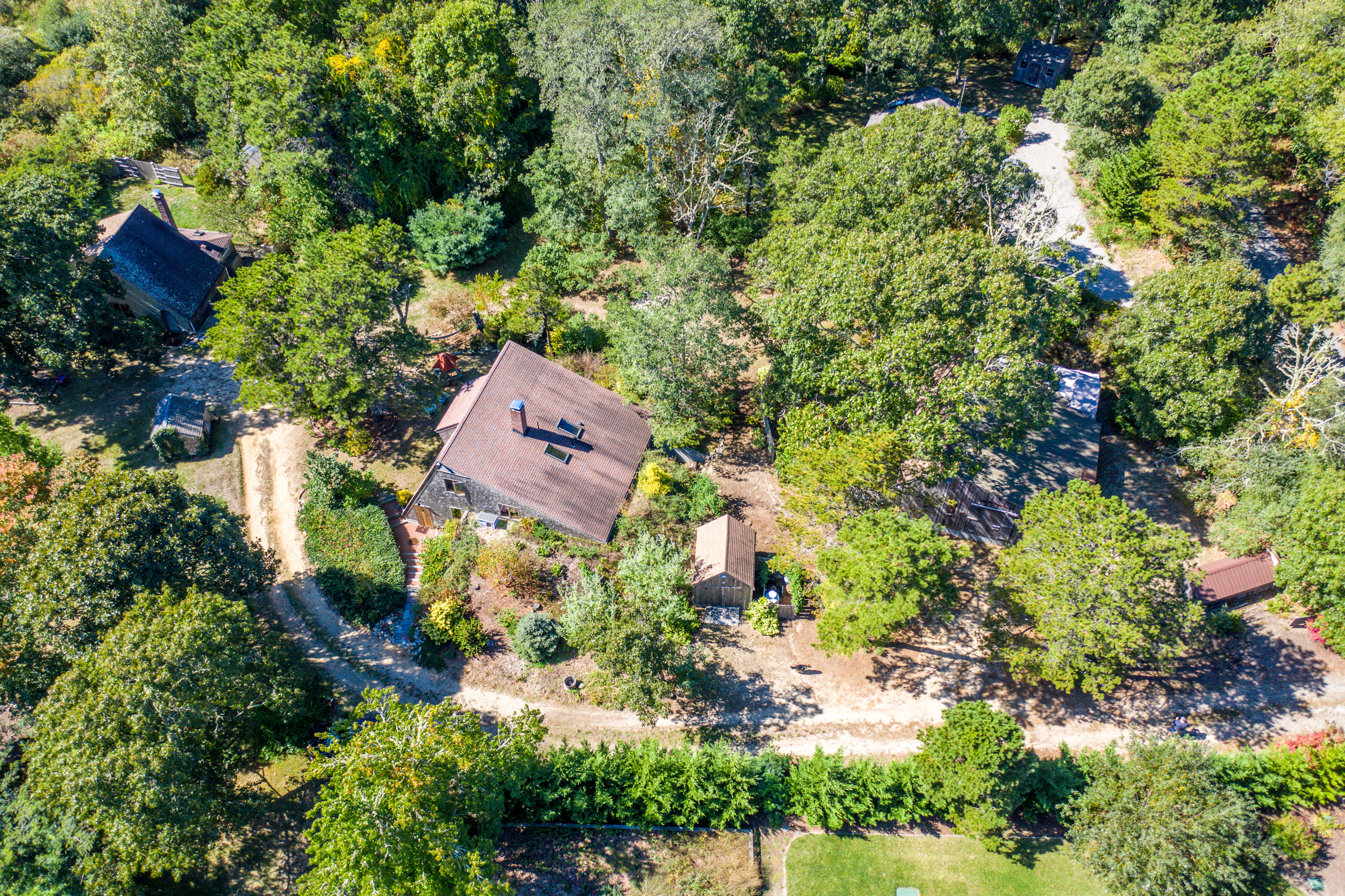 80 Peace Valley Road Wellfleet, MA 02667 - Photo 8 of 52 an aerial view of residential house with outdoor space and trees all around