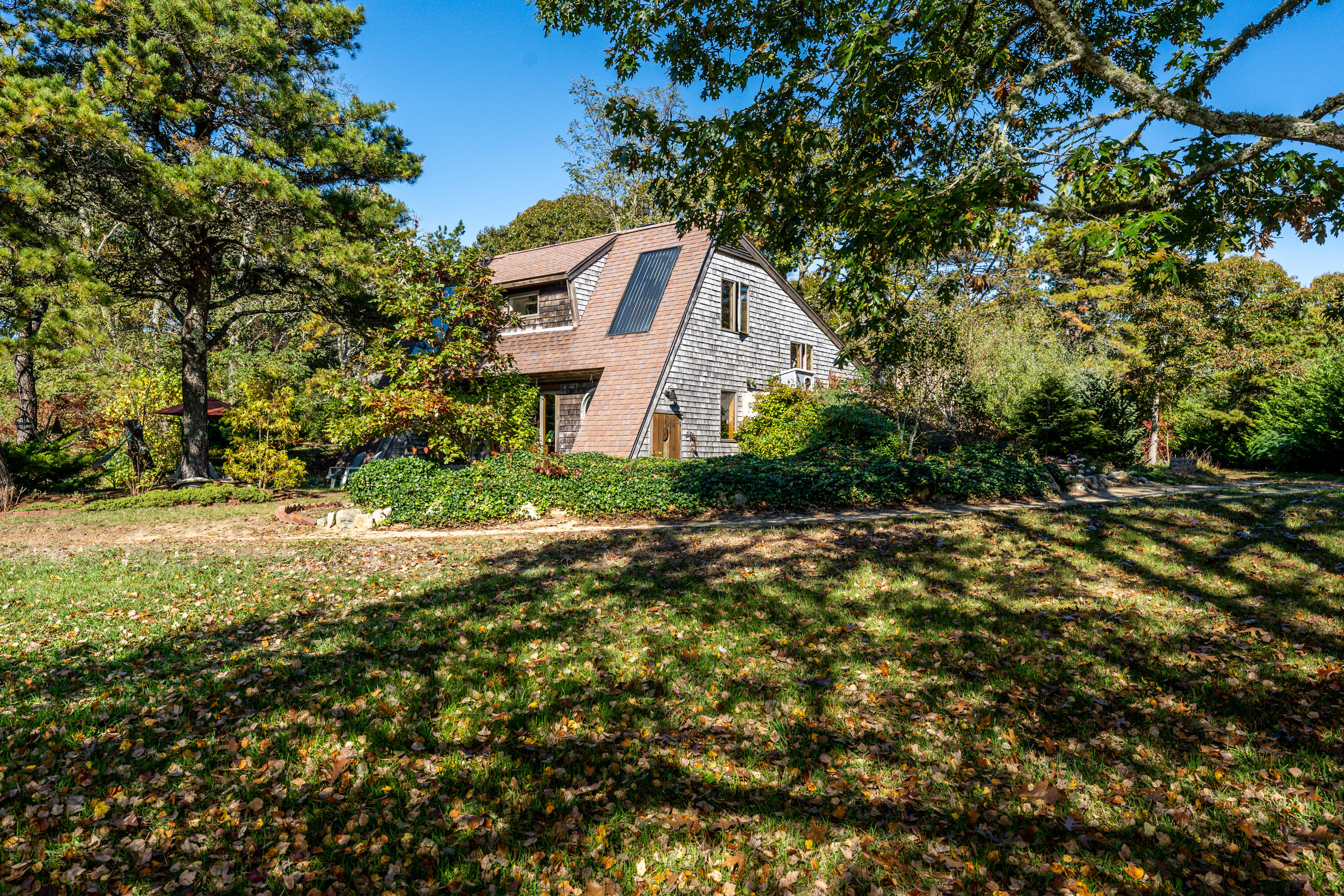 80 Peace Valley Road Wellfleet, MA 02667 - Photo 9 of 52 a house view with a backyard space
