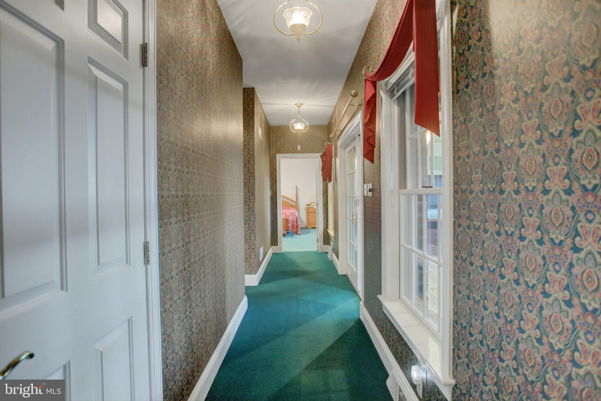550 Kohler Road Chambersburg, PA 17202 - Photo 8 of 55 Hallway to bedrooms and sunroom