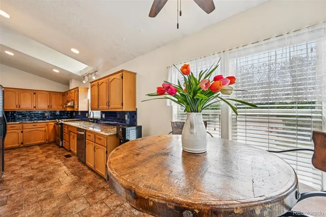a view of kitchen with sink and cabinets