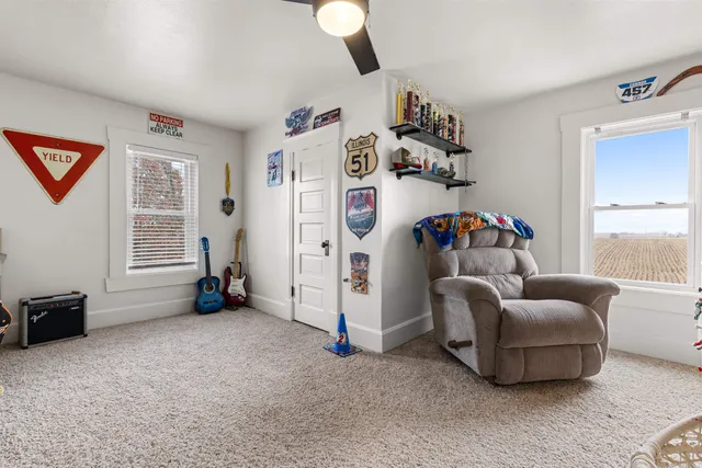 a bedroom with furniture and a bed