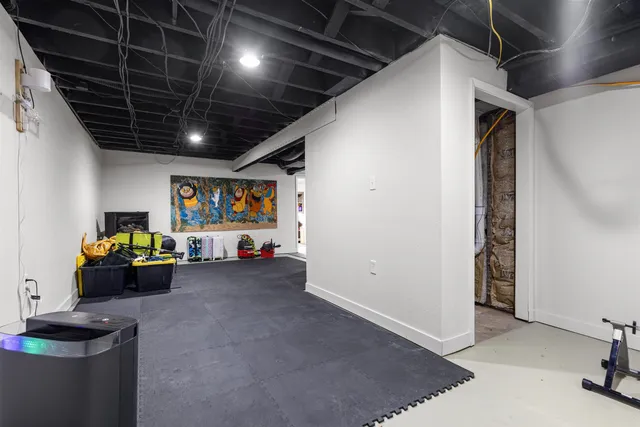 a view of livingroom with furniture and a flat screen tv