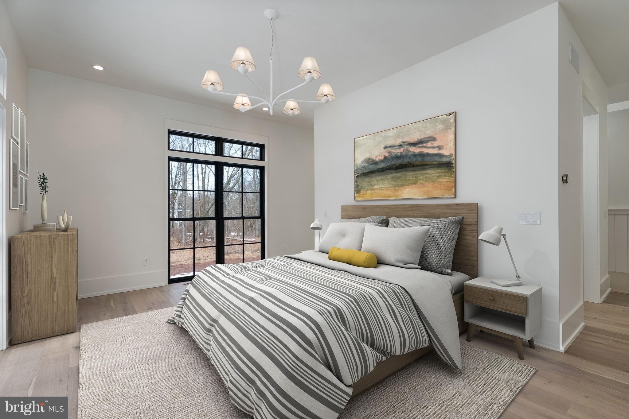 241 Carter Road Princeton, NJ 08540 - Photo 12 of 28 a bedroom with a bed and a painting on the wall