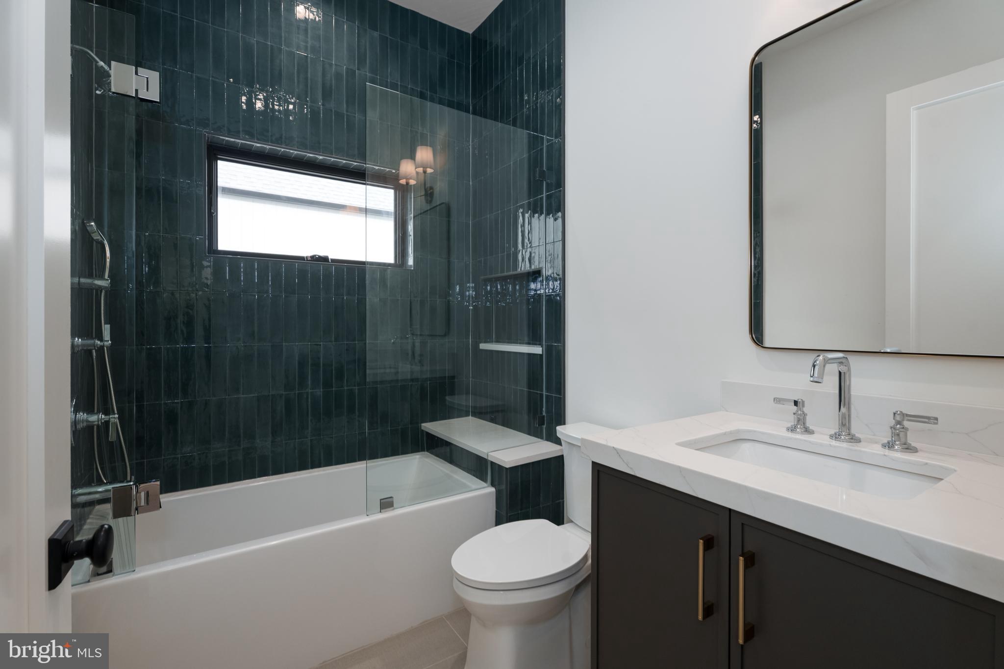 241 Carter Road Princeton, NJ 08540 - Photo 20 of 28 a bathroom with a sink a toilet and shower