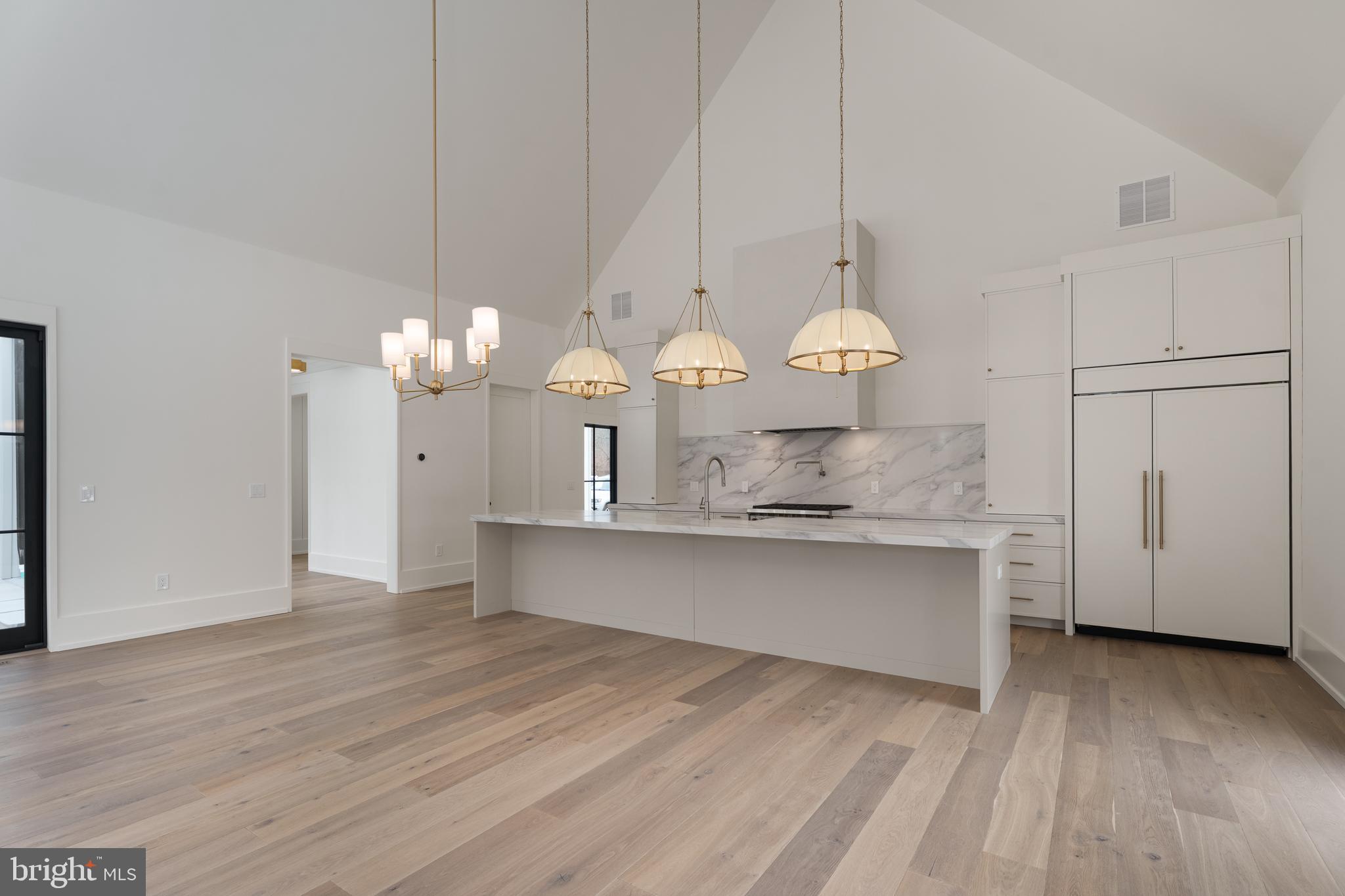 241 Carter Road Princeton, NJ 08540 - Photo 7 of 28 a view of a kitchen with granite countertop stainless steel appliances and wooden floor
