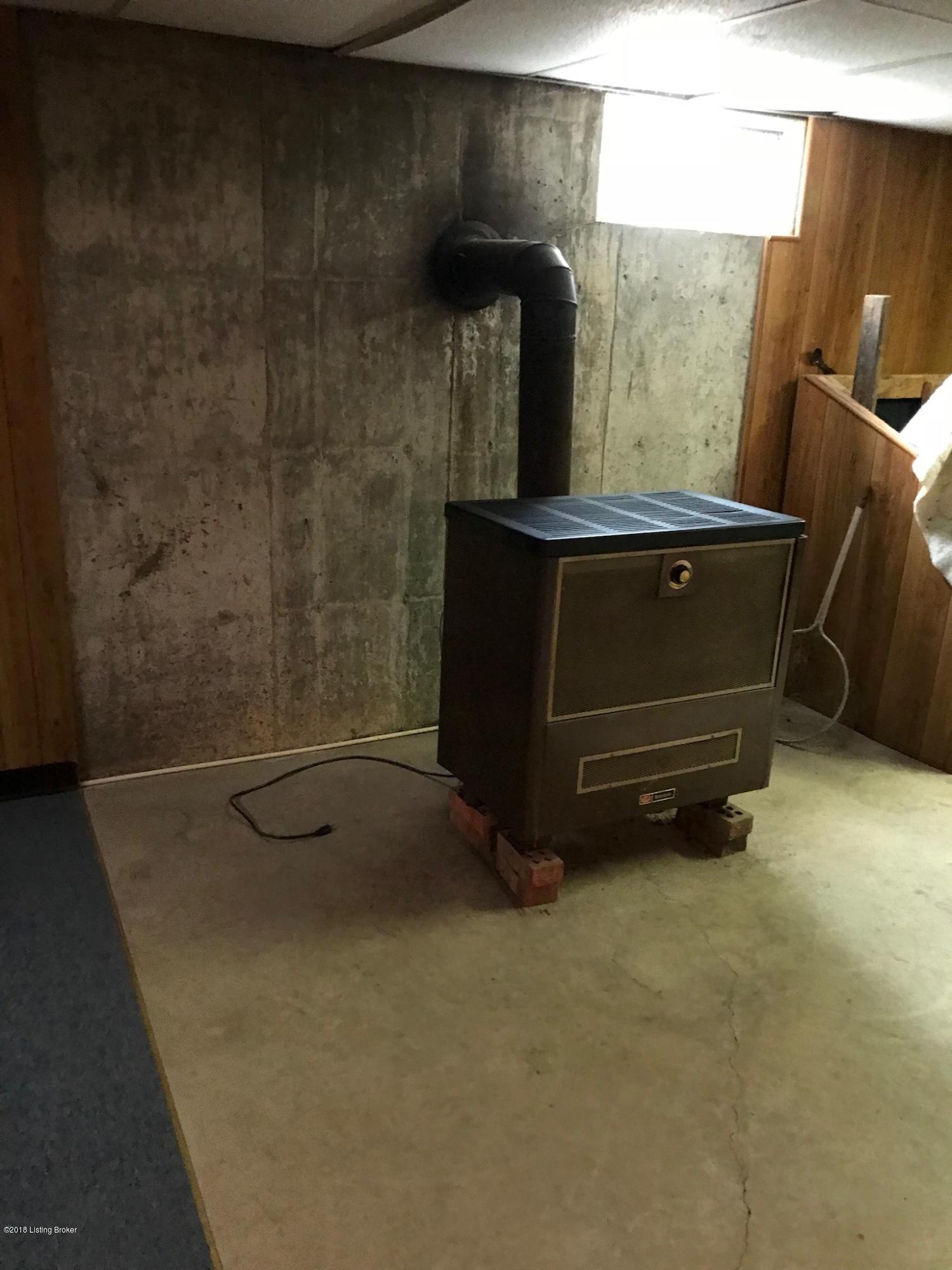 505 Bunger Road Ekron, KY 40117 - Photo 60 of 69 Wood stove in bsmt. To remain.