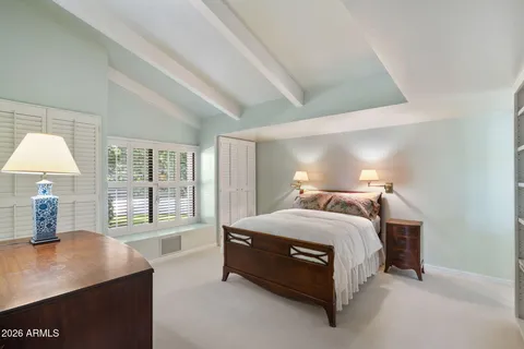 a view of an empty room with a balcony