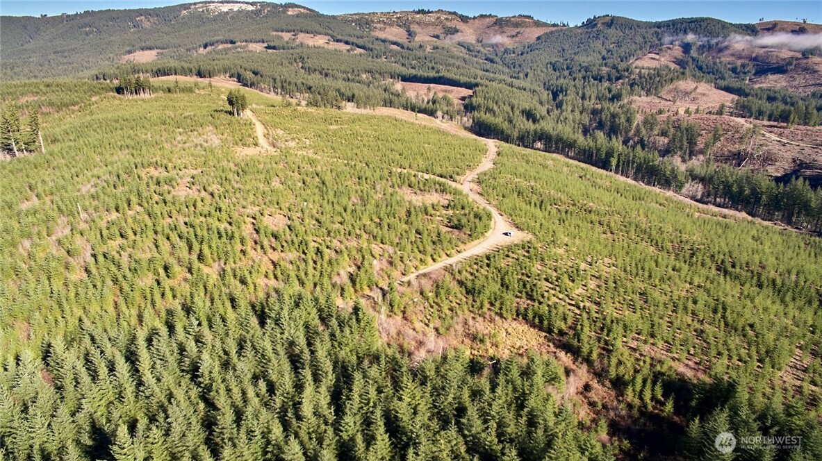 a view of a lake with mountains in the background