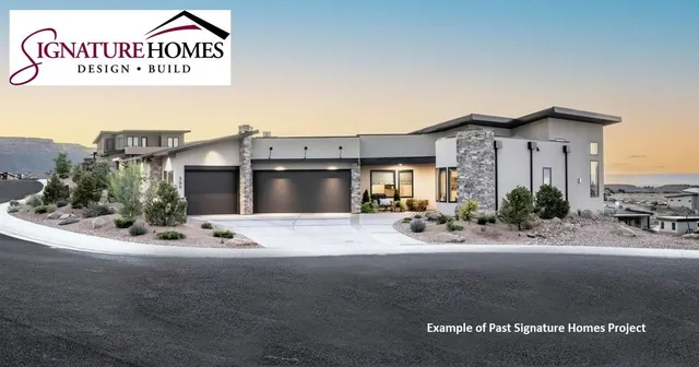 a front view of a house with a garden and yard