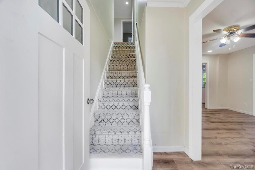 815 Udall Road West Islip, NY 11795 - Photo 24 of 45 Stairs with wood finished floors, a ceiling fan, and recessed lighting