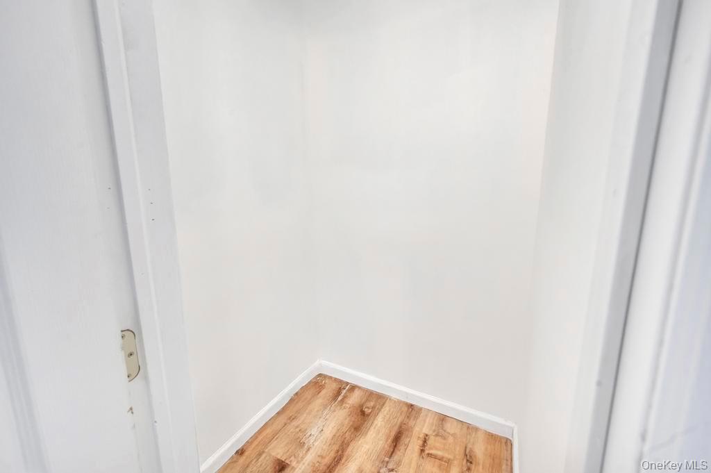 815 Udall Road West Islip, NY 11795 - Photo 32 of 45 Detailed view of wood finished floors and baseboards