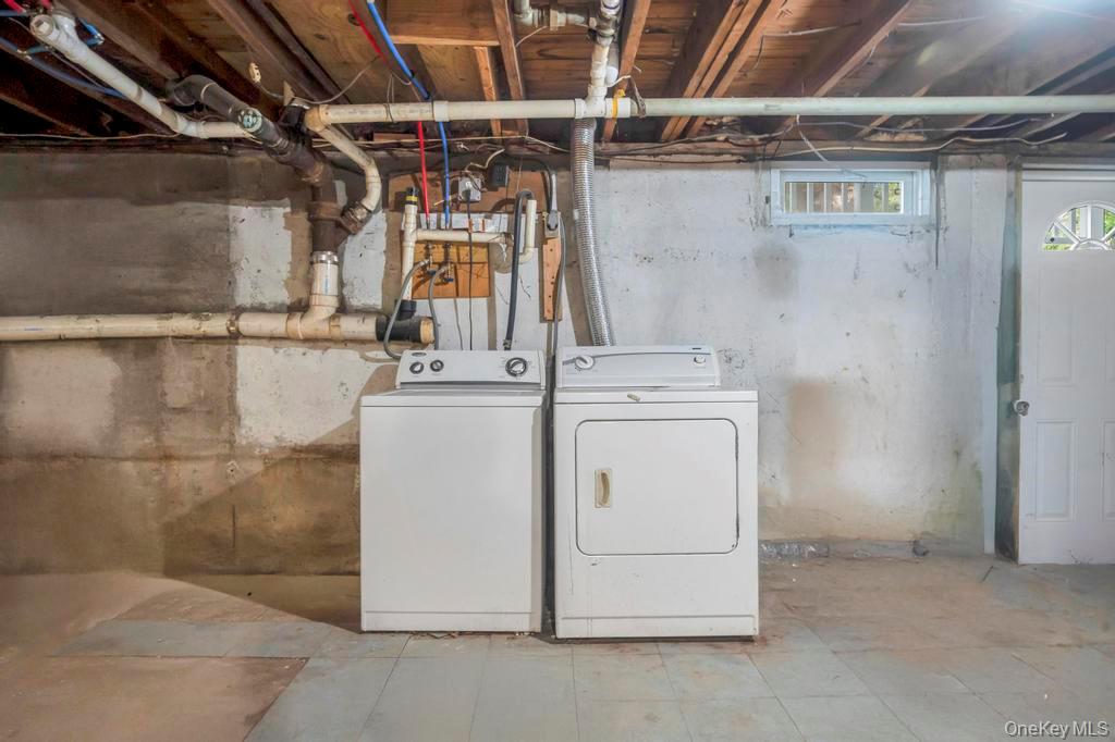 815 Udall Road West Islip, NY 11795 - Photo 40 of 45 Laundry room with washing machine and dryer