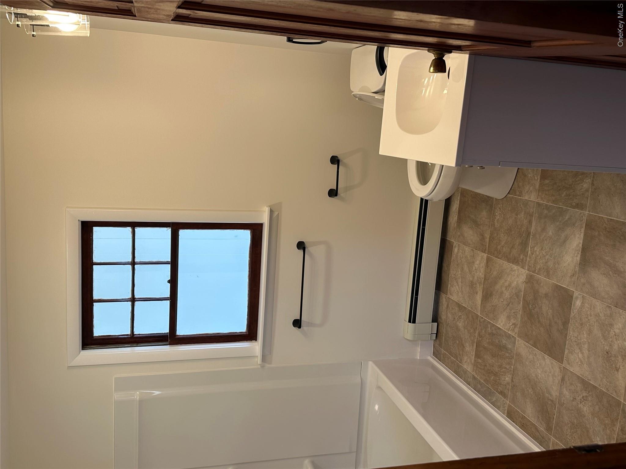 3 Indiana Road Goshen, NY 10924 - Photo 8 of 13 Updated clean bathroom with a full tub and shower on the first floor