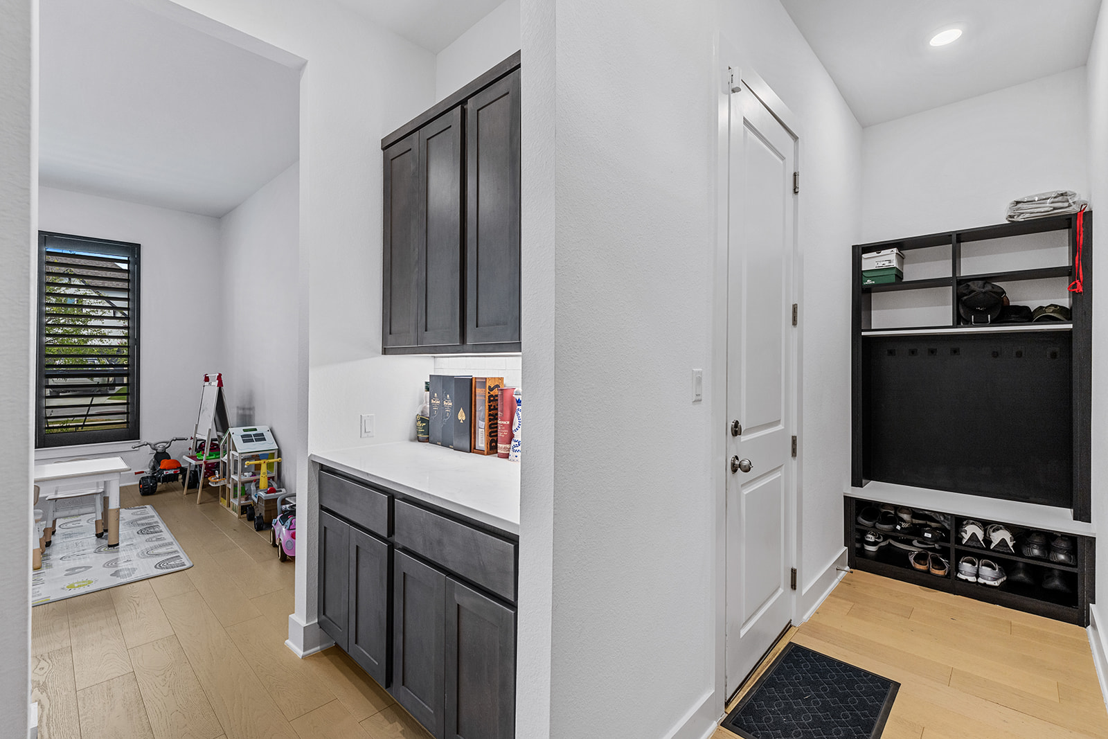 2905 Canto Trace Leander, TX 78641 - Photo 33 of 40 a view of a kitchen with fridge and wooden floor