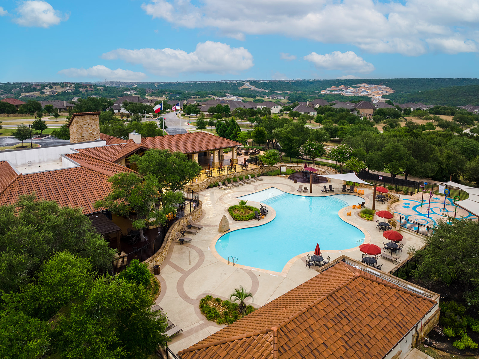2905 Canto Trace Leander, TX 78641 - Photo 38 of 40 an aerial view of a house with a swimming pool yard and mountain view in back