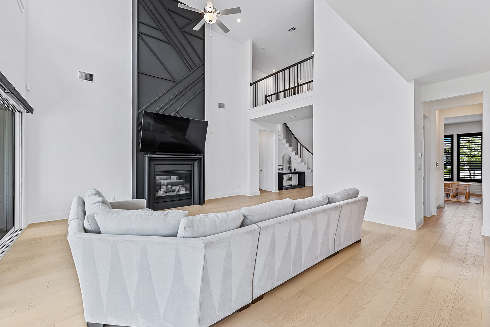 2905 Canto Trace Leander, TX 78641 - Photo 8 of 40 a living room with furniture and a flat screen tv