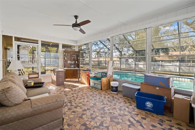 a view of a swimming pool with a patio