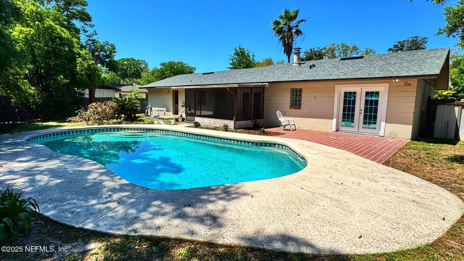 6124 Post Oak Road West Jacksonville, FL 32277 - Photo 2 of 42 Backyard with pool