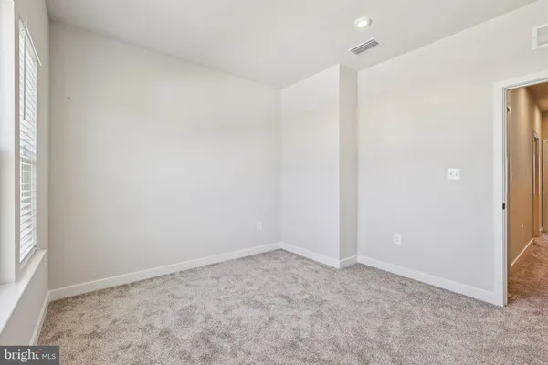 an empty room with an entryway