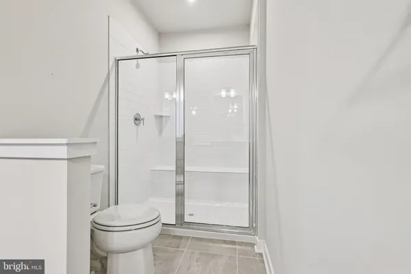 a bathroom with a sink vanity and a mirror