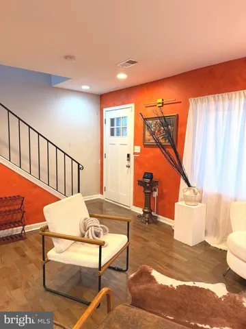 a view of a livingroom with furniture