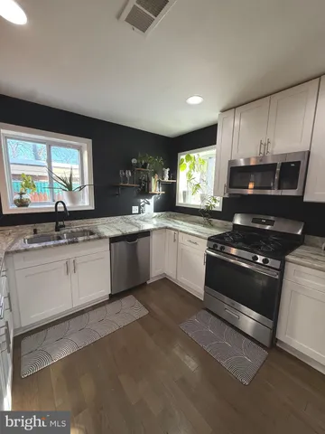 a view of kitchen from a window