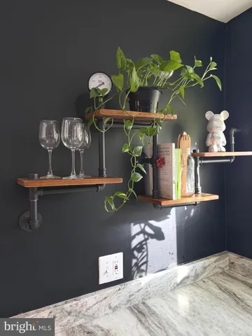 a kitchen with stainless steel appliances a refrigerator sink and cabinets