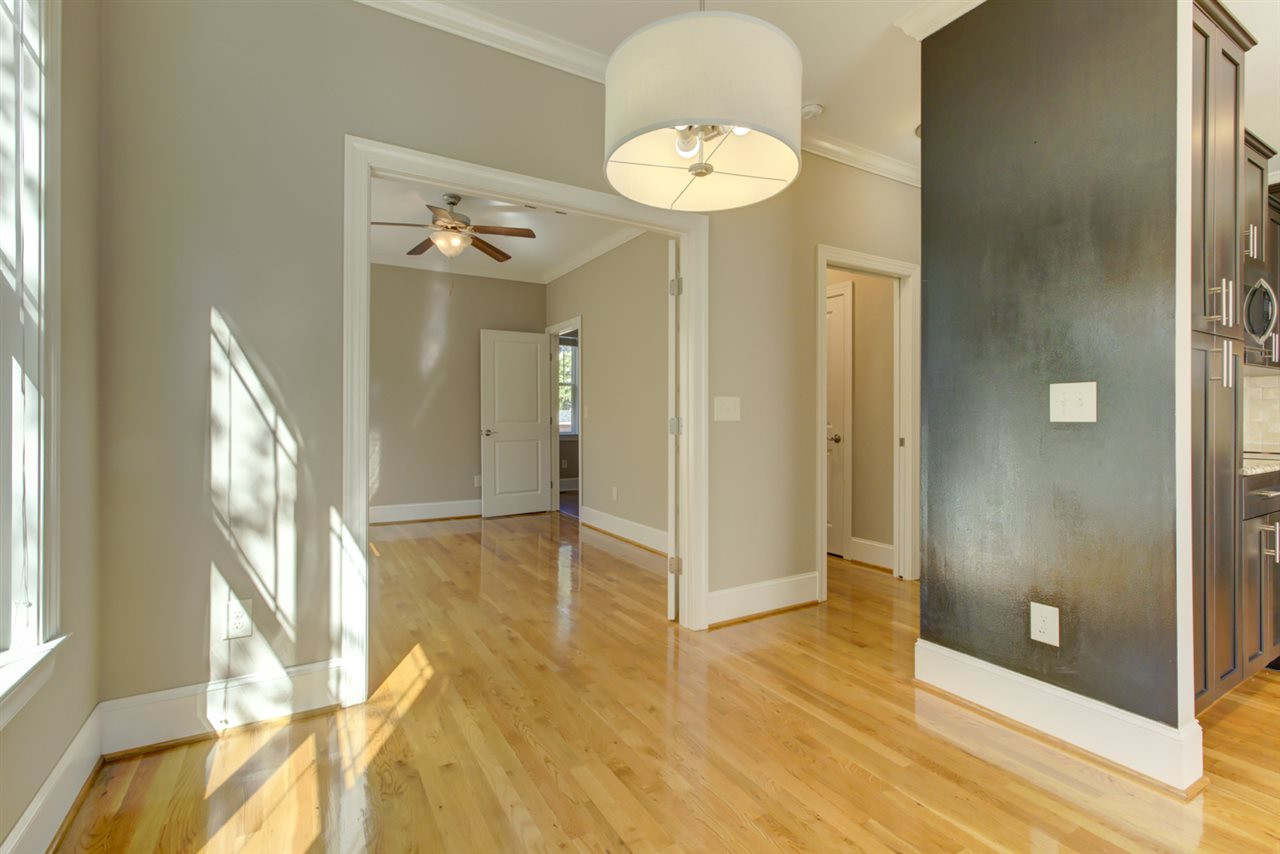 422 Heather Drive Raleigh, NC 27606 - Photo 13 of 30 The view from the Dining Room Edge looking into the Sun Room Looking into the Sun Room