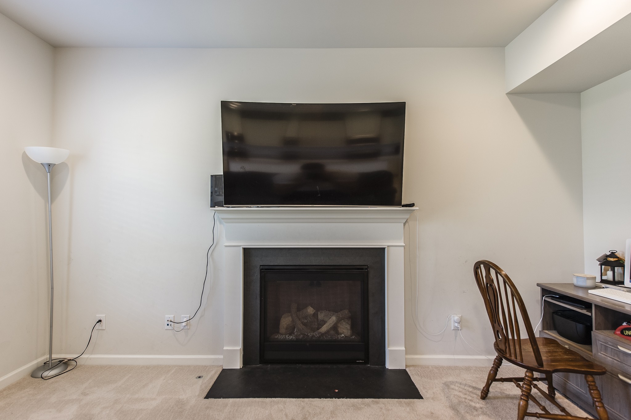 140 Hackney Lane Gallatin, TN 37066 - Photo 19 of 57 a living room with a fireplace and a flat screen tv