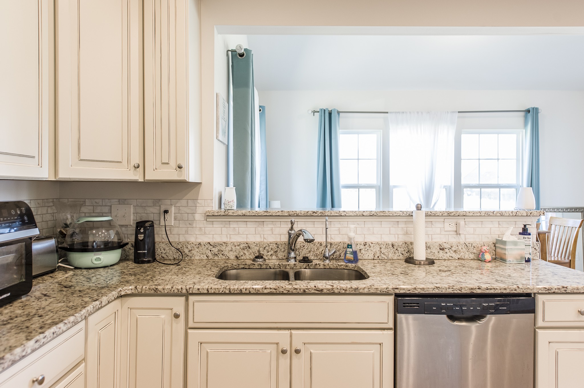140 Hackney Lane Gallatin, TN 37066 - Photo 23 of 57 a kitchen with granite countertop white cabinets and a sink