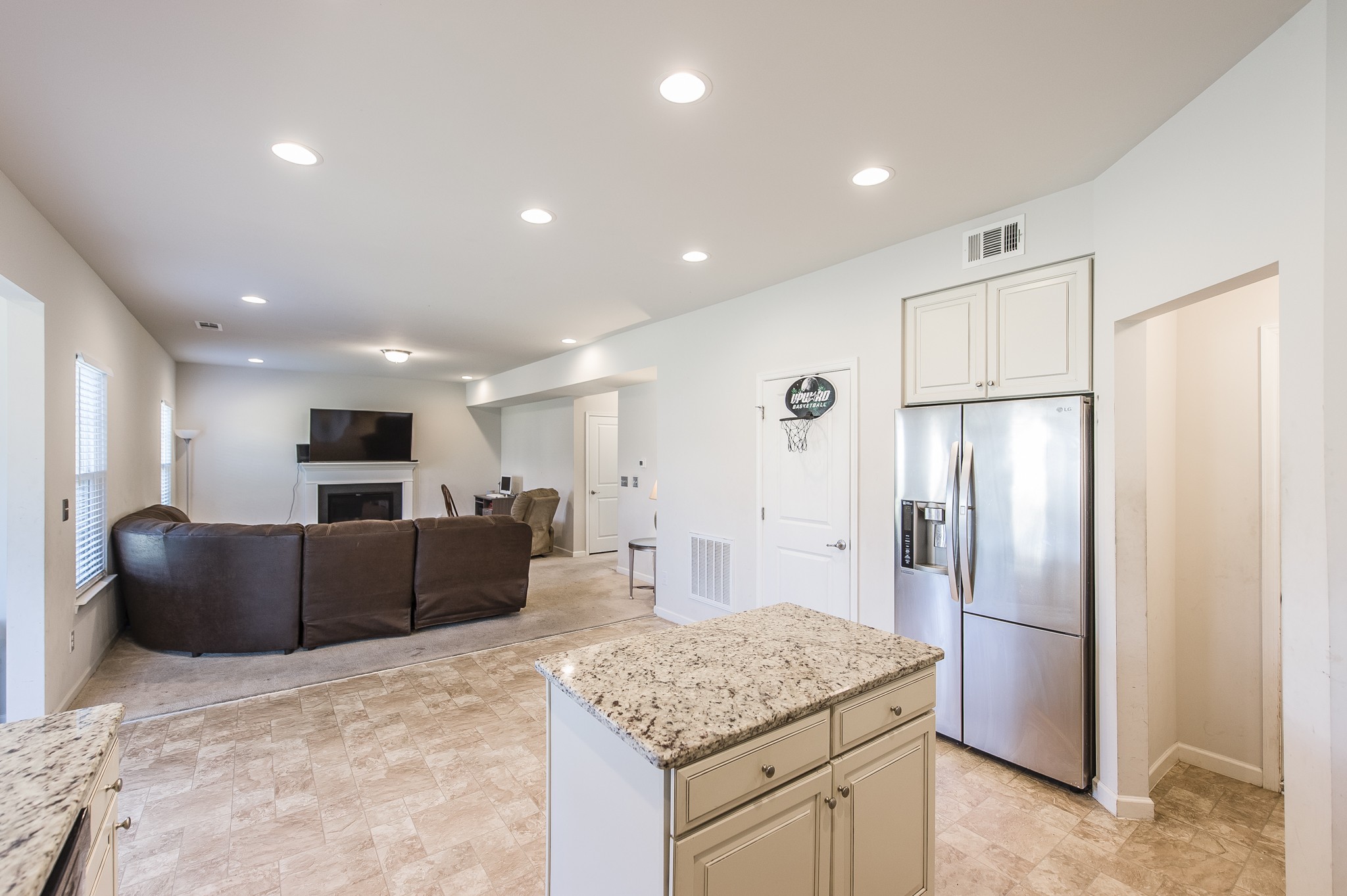 140 Hackney Lane Gallatin, TN 37066 - Photo 25 of 57 a kitchen with stainless steel appliances granite countertop a refrigerator and a stove top oven