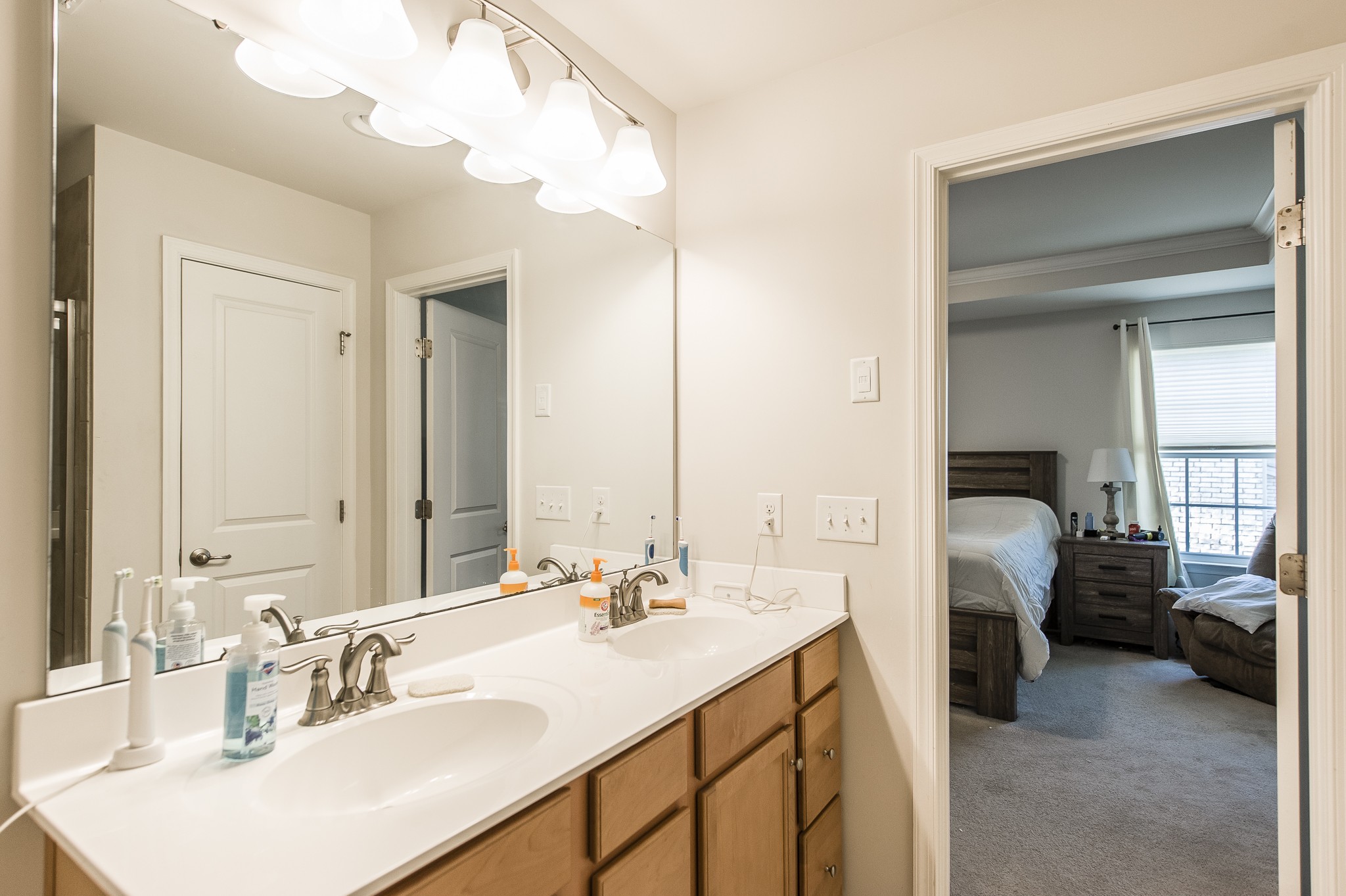 140 Hackney Lane Gallatin, TN 37066 - Photo 38 of 57 a en suite bathroom with a double vanity sink and a mirror